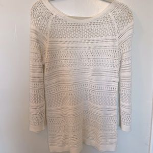 White knit sweater.